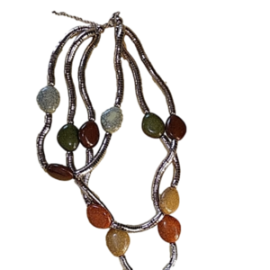 Bendable stone metal necklace approx 11" long very good condition silver tone